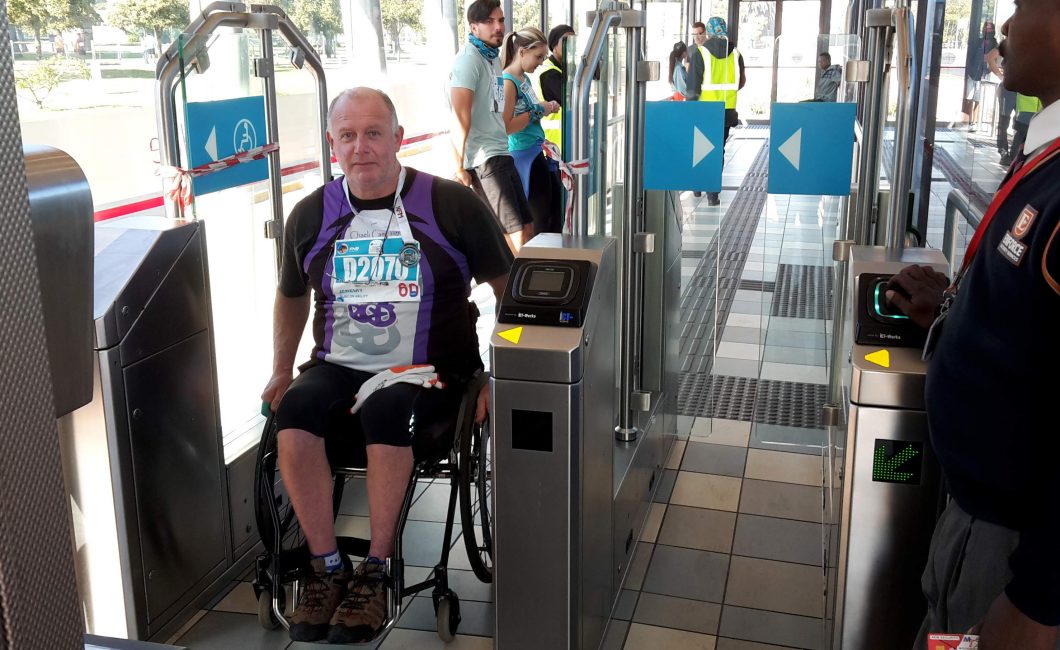 Photo of a wheelchair user exiting the MyCiti station at Woodbridge, Milnerton
